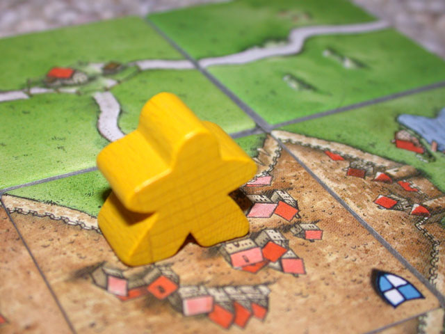 Meeple from Carcassonne, one of the easiest board games for beginners © Klo CC BY-SA 3.0.